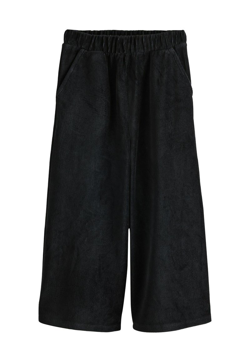 Crne manšete od korduroga s elastičnim pojasom, koje imaju dva bočna džepa i mekanu, teksturiranu površinu. Duljina doseže iznad koljena.