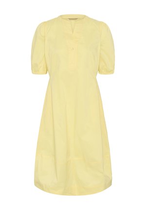 Kollane põlveni ulatuv kleit, millel on puff-varrukatega lühikesed varrukad, V-kujuline kaeluslõige ja ees ühe nupuga plastron.