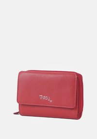 Red leather wallet with a flap closure, zippered edge, and embossed logo. Smooth texture and compact rectangular shape.