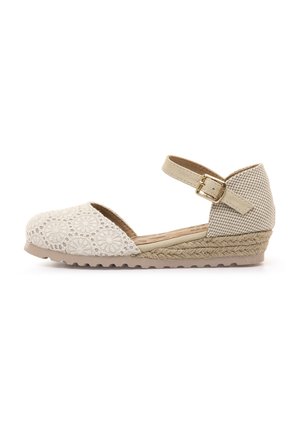 Espadrillas beige con tomaia in tessuto strutturato, design floreale traforato, cinturino regolabile alla caviglia e tacco a zeppa avvolto in juta. Suola in gomma.