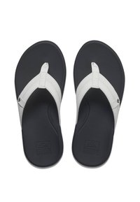 White leather flip-flops with a textured black rubber sole, featuring a thong strap design and logo on the insole.