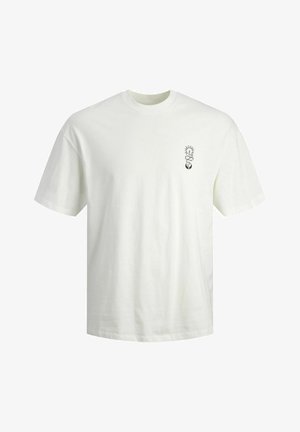 T-shirt en coton blanc avec un col rond, des manches courtes et un petit design graphique noir sur la zone gauche de la poitrine.