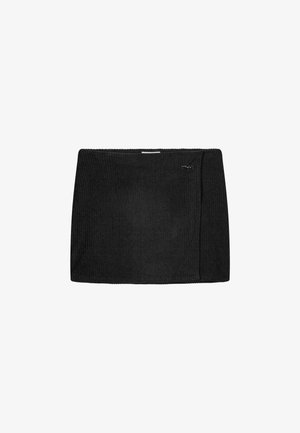 Black ribbed knit mini skirt with a straight cut, featuring a small logo accent on the side and an elastic waistband.