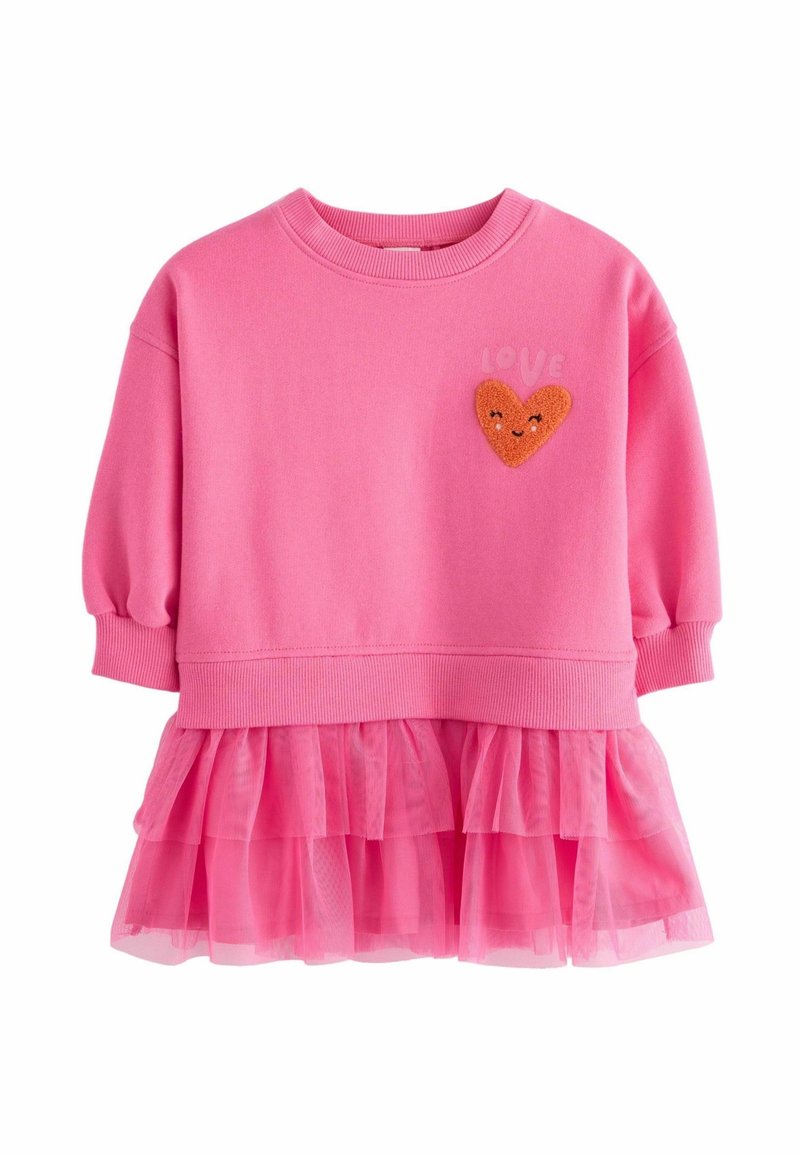 Sweat-shirt rose avec manches bouffantes, doté d'un bas en tulle doux et froncé. Comprend un patch cœur texturé et le mot « LOVE » en rose clair.