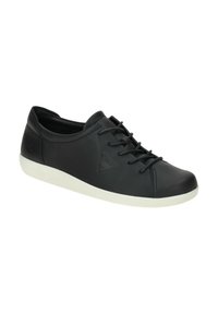 Sneaker in pelle nera con punta arrotondata, design con laccio, suola in gomma bianca e logo triangolare sul lato. Texture liscia, dettagli minimi.