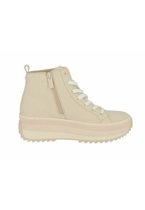Beige canvas high-top sneakers with white laces, side zip, and a chunky sole with a textured grip pattern.