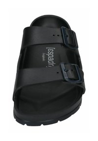 Black sandal with two adjustable straps and buckles, textured footbed, and a sturdy sole. Features brand logo on the insole.