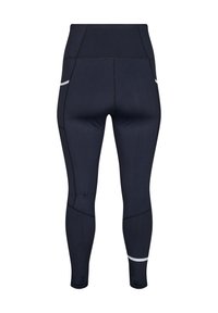 Granatowe legginsy wykonane z elastycznej tkaniny, z wysokim stanem, płaskimi szwami i odblaskowymi paskami po bokach.