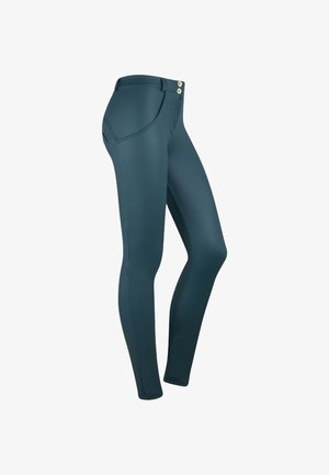 Hochtaillierte türkisfarbene Leggings aus dehnbarem Stoff, mit glatter Textur, zwei dekorativen Knöpfen an der Taille und eleganten Nähten.