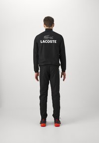 Lacoste Sport TRACKSUIT - Tuta - noir/blanc