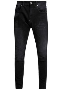 Jeans de mezclilla negra con corte ajustado, que presentan un diseño tradicional de cinco bolsillos, cierre de botón plateado y desvanecimientos sutiles en la tela.