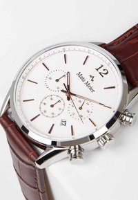 Brown leather strap watch with a silver stainless steel case, white dial, rose gold markers, and three sub-dials for chronograph functions.