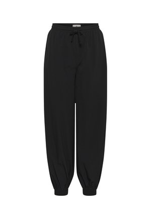 Pantalon de jogging noir à coupe ample avec taille élastique et cordon de serrage, doté de poignets élastiques aux chevilles.