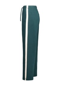 Pantaloni tuta turchesi con una striscia laterale bianca, dotati di una vita elasticizzata e cordoncino. Il tessuto sembra morbido con una superficie liscia.