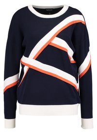 Marinblå tröja med vita och orange diagonala ränder. Har en rund halsringning och ribbade ärmslut och nederkant. Mjuk, stickad tyg.