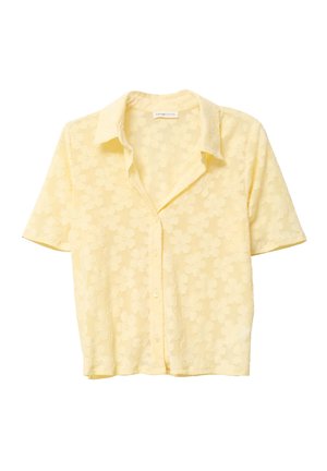 Blouse à manches courtes, jaune, avec un motif floral, fermeture par boutons et texture douce. Dotée d'un col classique et d'une coupe décontractée.