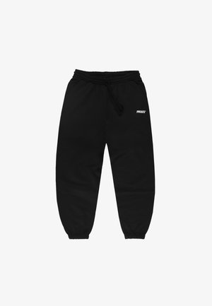 Czarne spodnie dresowe z elastycznym pasem i ściągaczami, sznurkiem oraz małym białym logo "PROSTO" na górnej lewej części uda.