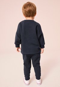 Next LONG SLEEVE AND SET - Trainingsanzug - navy transport