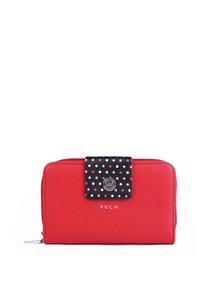 Red wallet with a polka dot flap in black, silver hardware, zip closure, and embossed "VUCH" logo on the front. Textured material.