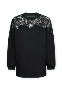 Sudadera negra con un revestimiento de encaje en los hombros, mangas largas, cuello redondo y un ajuste relajado, con un detalle de tela texturizada.