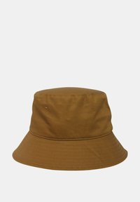 Cappello a secchiello in cotone marrone con una consistenza morbida e liscia, tesa larga che pende verso il basso e parte superiore strutturata. Nessun motivo o accento visibile.