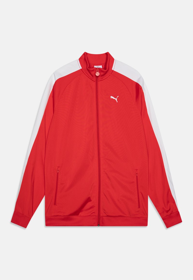 Giacca da performance rossa con colletto alto, pannelli laterali bianchi, tasche con zip e un logo bianco ben visibile sul lato sinistro del petto.