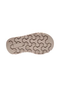 Suela de zapato en goma beige con un patrón de panal, que cuenta con secciones texturizadas y una ranura rectangular para agarrar y flexibilidad.