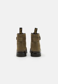 Dr. Martens Botines con plataforma - olive