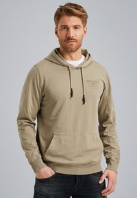 Sweat à capuche kaki avec une poche frontale, des cordons de serrage et un logo détaillé sur la poitrine ; fabriqué en tissu doux en mélange de coton.