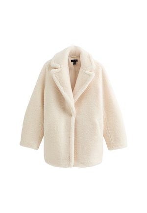 Cappotto fluffy color crema con colletto a punte, apertura frontale e tasche laterali. Tessuto morbido, forma oversize e vestibilità rilassata.
