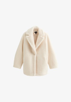 Crème-kleurige fluffy jas met een geknoopt kraagje, open voorkant en zijzakken. Zachte textuur, oversized vorm en ontspannen pasvorm.