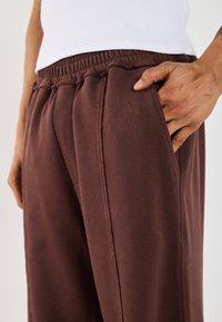 YOURTURN UNISEX - Træningsbukser - brown