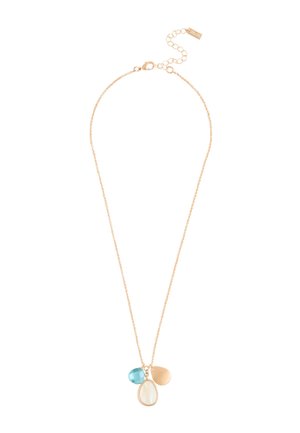 Delicate gold chain necklace with three pendants: one blue teardrop gem, one white teardrop gem, and one smooth gold teardrop charm.