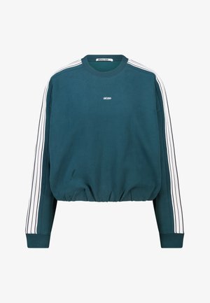 Sweat-shirt court bleu sarcelle avec un col rond, des accents de bandes blanches le long des manches et un ourlet froncé. Petit logo sur la poitrine.