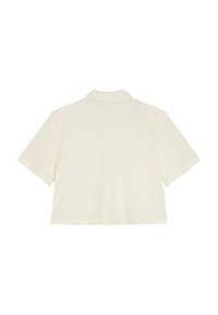 Chemise courte à manches courtes de couleur crème texturée avec col, présentant une forme rectangulaire et un motif à carreaux subtil.