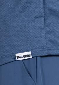 Smilodox POWERFIT TRIPLE PERFORMANCE - T-shirt till träning - dunkel blau
