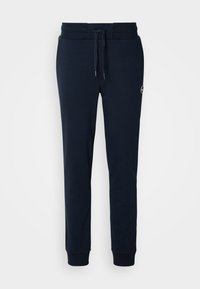 Pantaloni felpati blu navy realizzati in tessuto morbido, con vita elastica e cordino, e polsini aderenti alle caviglie.