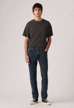 Džínsy tapered fit - blue aria