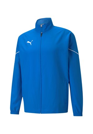 Leichte blaue Jacke mit hohem Kragen, Reißverschluss vorne, elastischen Bündchen und weißen Akzenten. Mit einem Logo auf der Brust.