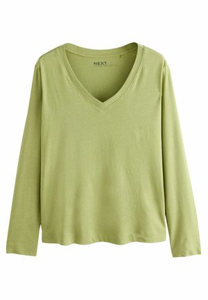 Long-sleeve, V-neck top in pale green, made of soft cotton material with a smooth texture and a straight hemline.