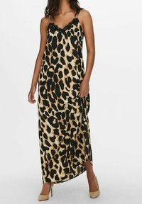 Maxikleid mit Leopardenmuster in Schwarz- und Beigetönen, verstellbaren Spaghettiträgern, Spitzenbesatz und einem seitlichen Knotendetail. Glatte Stoffoberfläche.