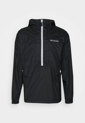 Zwarte Columbia windbreaker met capuchon, witte halve ritssluiting en elastische manchetten, van voren getoond op witte achtergrond.