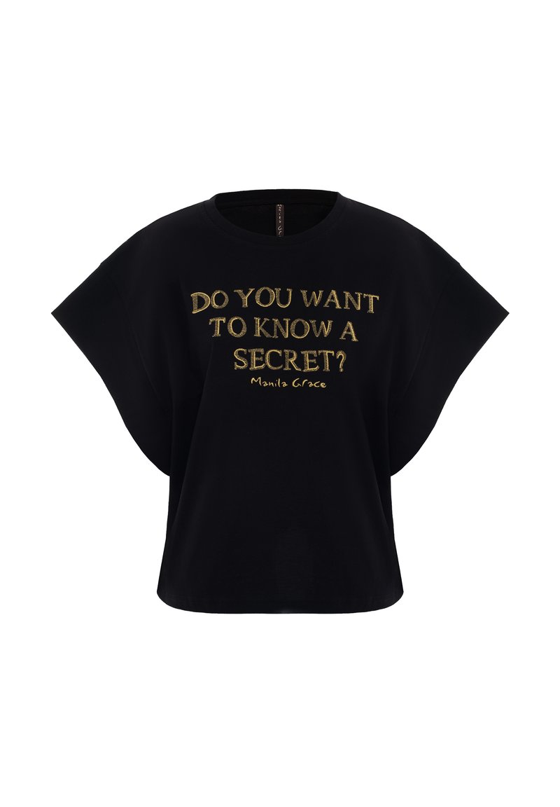 Chemise noire à manches courtes larges, avec un texte doré : "VEUX-TU CONNAÎTRE UN SECRET ? Manila Grace" sur le devant.