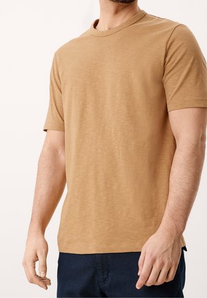 Braunes T-Shirt mit kurzen Ärmeln aus weichem Stoff und rundem Ausschnitt, mit einer dezenten Struktur und einer Silhouette mit normaler Passform.
