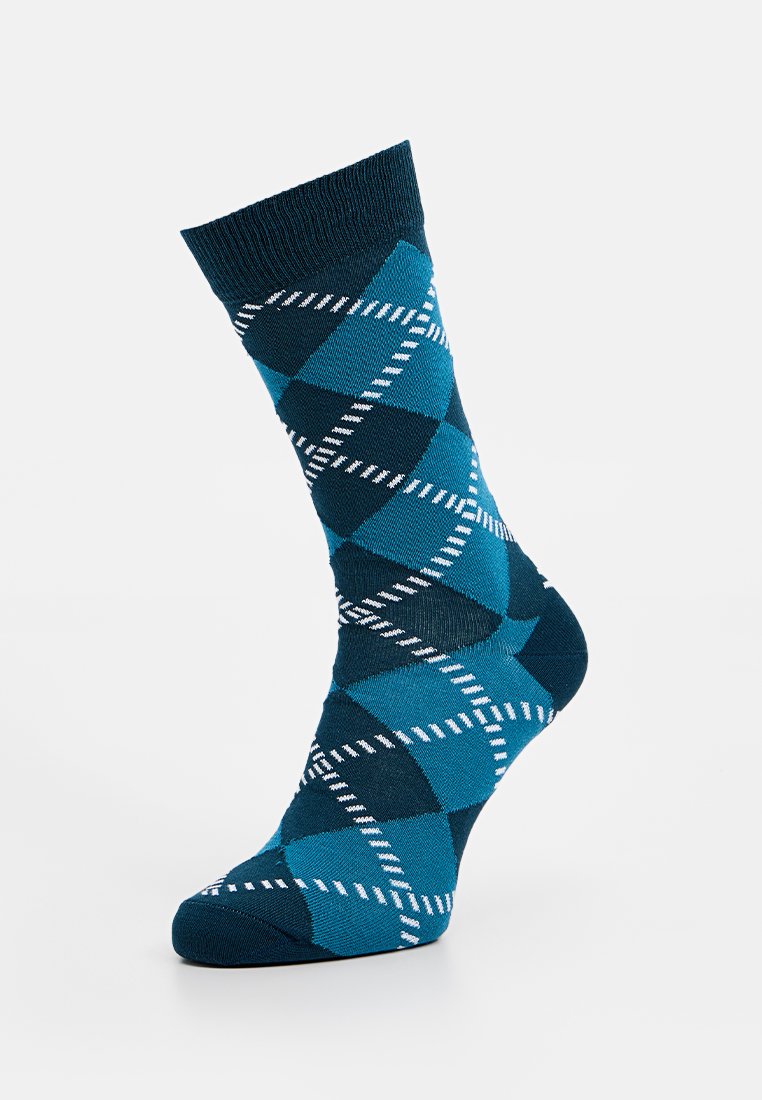 Blaue und türkise Argyle-Socken mit weißem Rautenmuster, ausgestattet mit einem gerippten Bündchen und glatter Textur. Entworfen für Komfort und Stil.