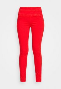 Leggings en denim rouge, extensibles, avec une taille haute, coupe ajustée et fausses poches à l'avant. Texture lisse et couleur uniforme.