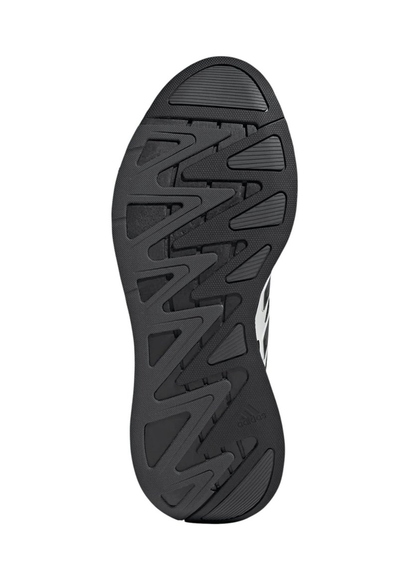 Suola di scarpa da ginnastica nera con un motivo a zigzag, caratterizzata da accenti grigi e una superficie testurizzata per una migliore aderenza. Il logo del marchio è visibile.