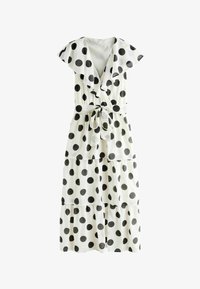 Valittu, cream and black spot