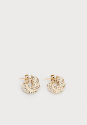 Gold-tone stud earrings featuring a swirling design adorned with clear rhinestones along the edges, creating a textured appearance.