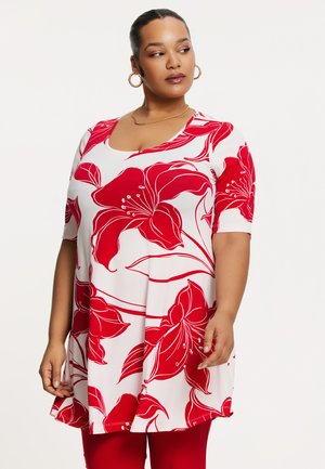 Rood bloemen tuniek met korte mouwen, voorzien van een ronde hals en een vloeiende uitstraling. Gemaakt van zachte stof met gedurfde rode en witte kleuren.